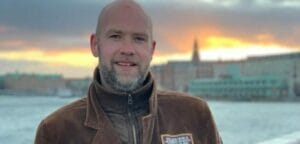 A man smiling for the camera.