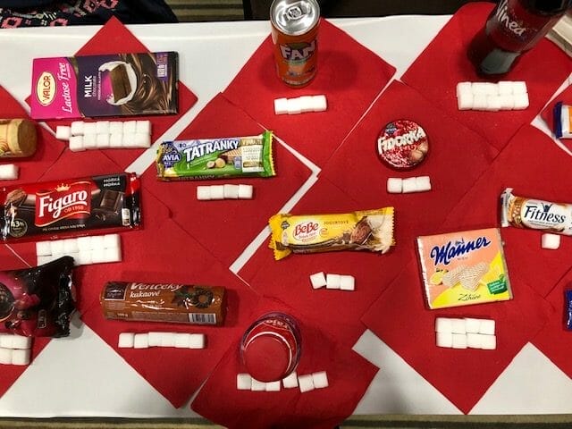 A table with a variety of snacks on it.