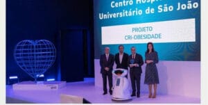 A group of people standing on a stage.