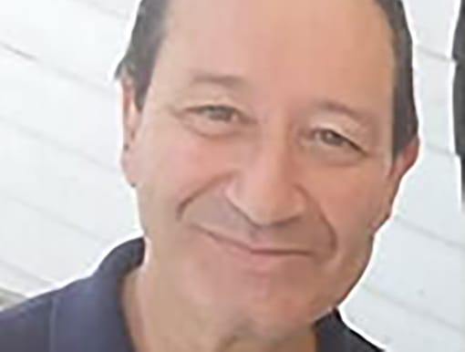 A man smiling for the camera.