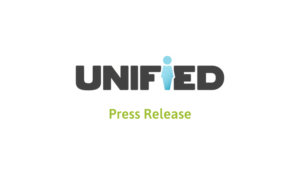 The word "UNIFIED" in black letters with a blue figure as the "I," and "Press Release" written in green below on a white background.